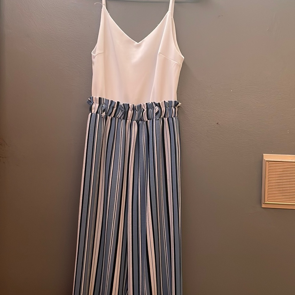 Only worn once!!! Size small but can fit medium!